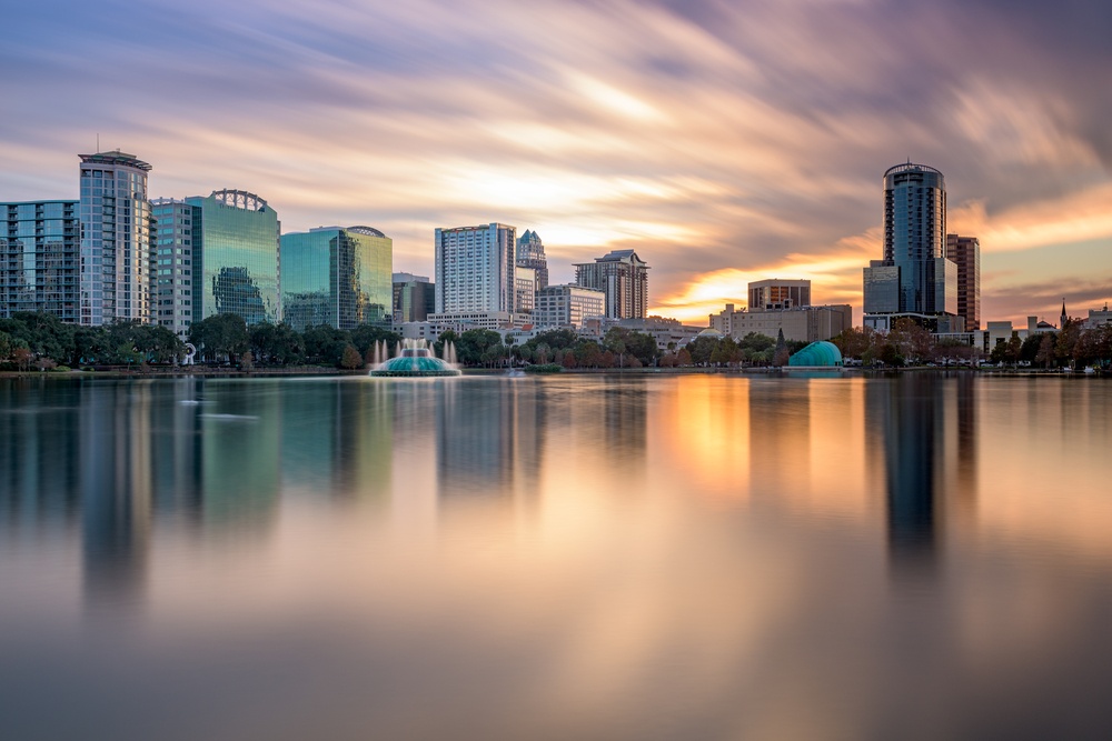 Orlando, Florida, USA skyline at Eola Lake.